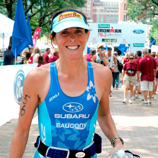 running goals for beginners - Lisa crosses Ironman Australia finish line, where she won five straight victories from 2002 through 2006