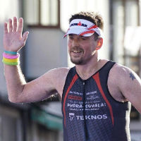 Ironman crossing finish line
